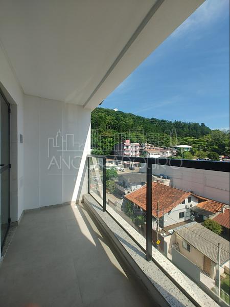 2 Dormitórios (1 suíte), Sacada com churrasqueira, 1 Vaga garagem privativa. Nações em Balneário Camboriú. — foto 2