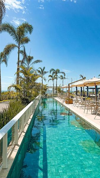 Terraço privativo, 3 Dormitórios (1 suíte), 1 Vaga garagem, 5000m² de área de lazer, Frente mar em Balneário Piçarras. — foto 32