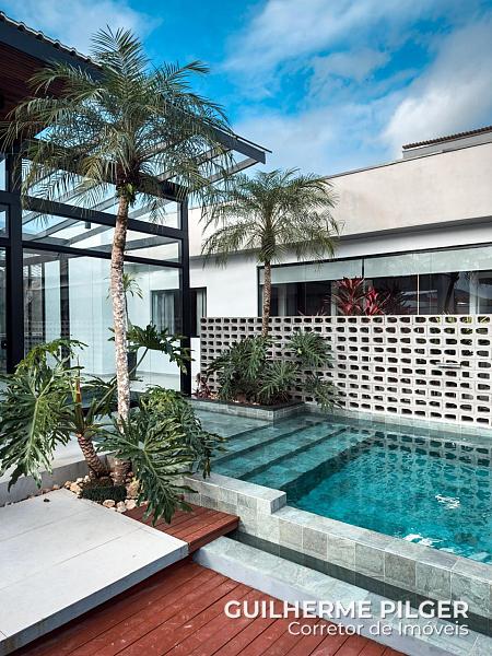 Casa no Cond. Caled�nia Private Village em Cambori� - SC 1