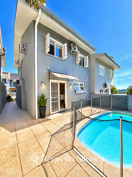 Casa � venda no Condom�nio Schneider, em Novo Hamburgo. 146 m�, 3 dormit�rios, su�te com closet, piscina aquecida, churrasqueira e 2 vagas. 1