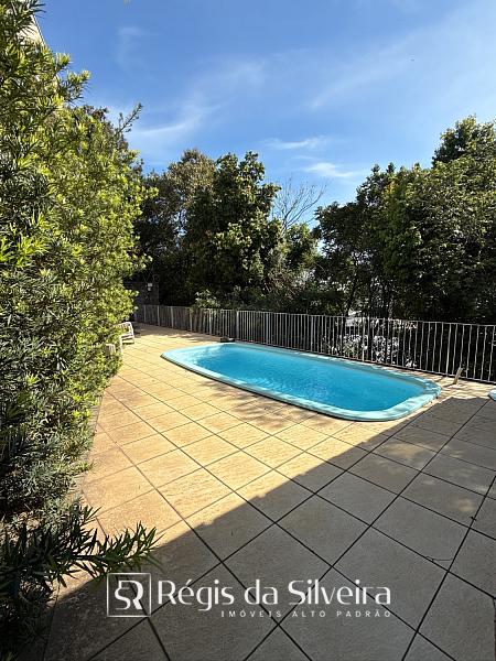 Casa � venda no Condom�nio Schneider, em Novo Hamburgo. 146 m�, 3 dormit�rios, su�te com closet, piscina aquecida, churrasqueira e 2 vagas. 32